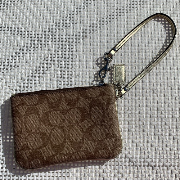 Coach wristlet in Signature Canvas with gold trim - Picture 3 of 8